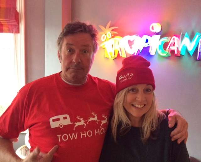 Roland and Monica Rivron wearing an Official Tow Ho Ho Caravan Gift